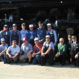 The Engine 819 restoration/operations crew pose with the results of their efforts.